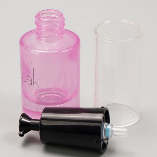 Frasco de vidrio rosa con tapón transparente